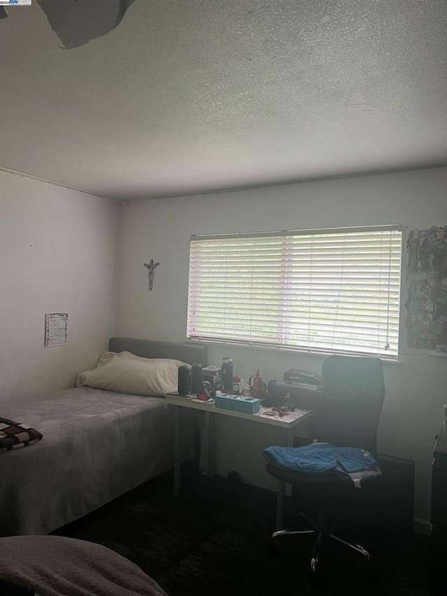 bedroom featuring multiple windows