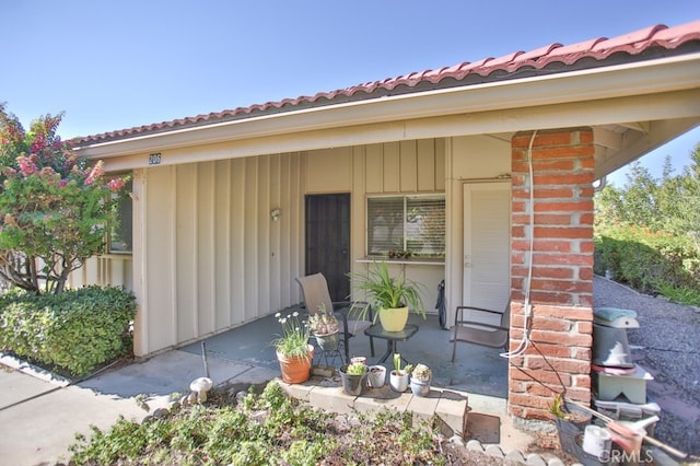 property entrance with a patio