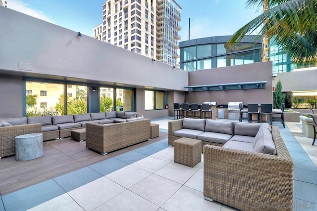 view of patio featuring outdoor lounge area and grilling area