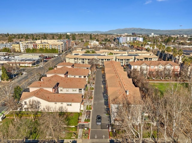 drone / aerial view featuring a mountain view