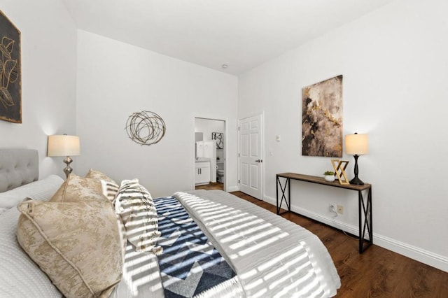 bedroom with dark hardwood / wood-style floors