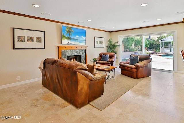 living room with a fireplace and crown molding