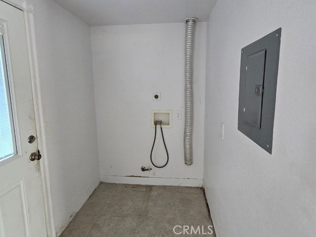 laundry area with washer hookup, electric panel, hookup for an electric dryer, and hookup for a gas dryer