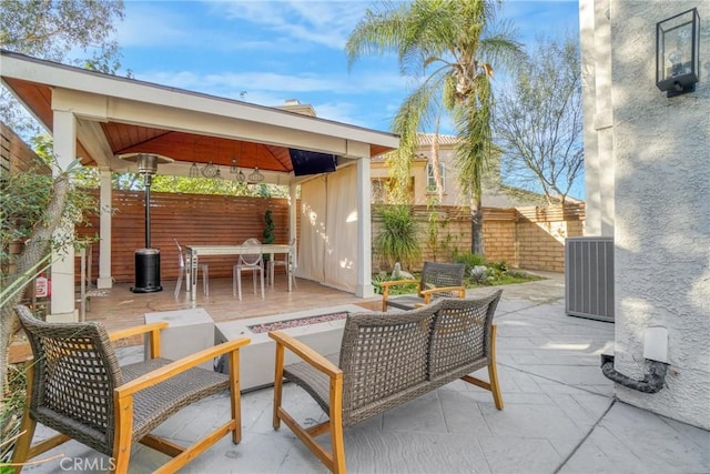 view of patio / terrace with a gazebo and central AC