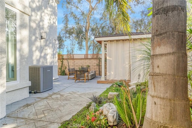 view of patio / terrace featuring cooling unit