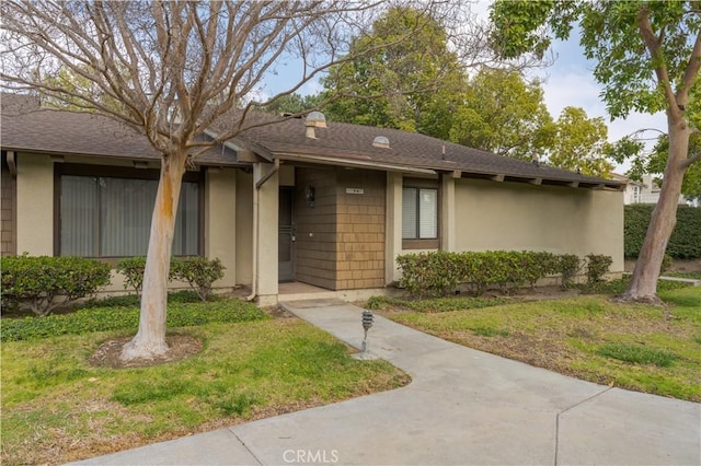 exterior space with a lawn