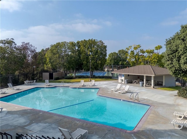 view of pool featuring a patio and a gazebo