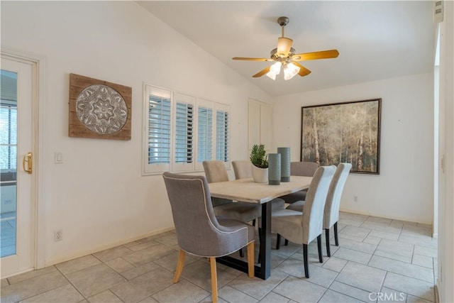 dining room featuring vaulted ceiling and ceiling fan