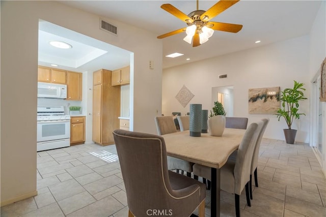 dining room featuring ceiling fan