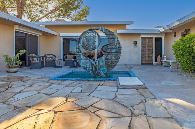 view of patio with an outdoor living space