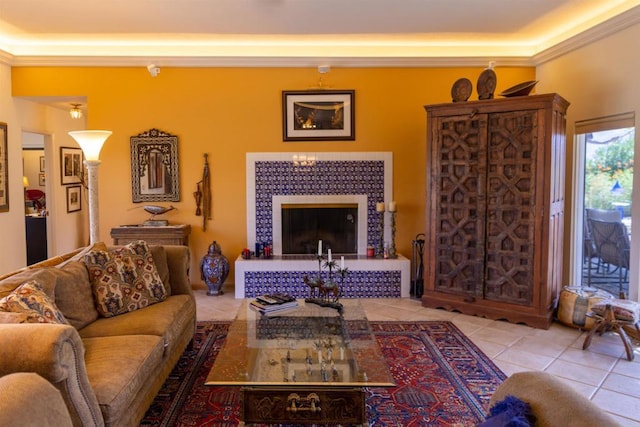 tiled living room with ornamental molding and a fireplace