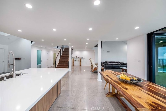 kitchen featuring sink and a large island