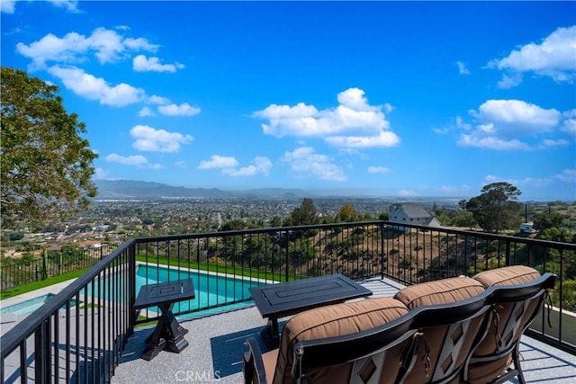 balcony featuring a mountain view