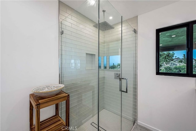 bathroom with an enclosed shower