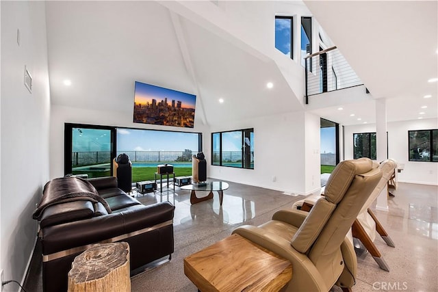 living room with a towering ceiling