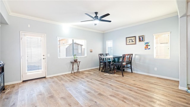 dining room featuring ceiling fan, light hardwood / wood-style floors, and ornamental molding