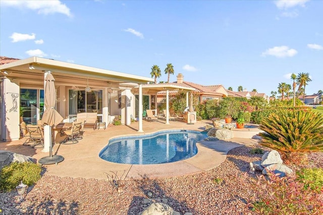 view of swimming pool featuring a patio