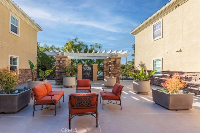 view of patio / terrace with an outdoor living space and a pergola