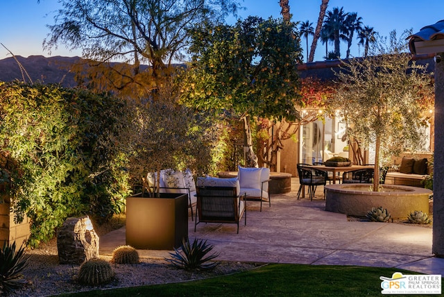 view of patio / terrace with a mountain view