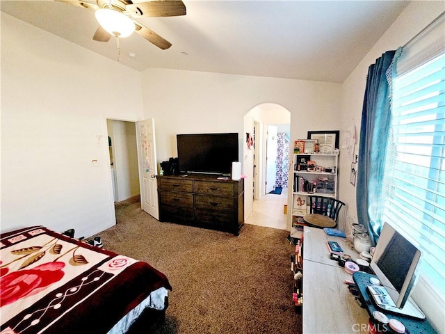 bedroom featuring ceiling fan and light carpet