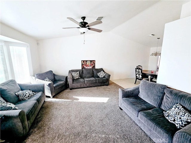 carpeted living room featuring lofted ceiling and ceiling fan