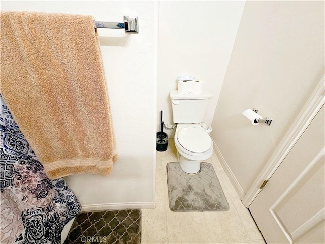 bathroom featuring toilet