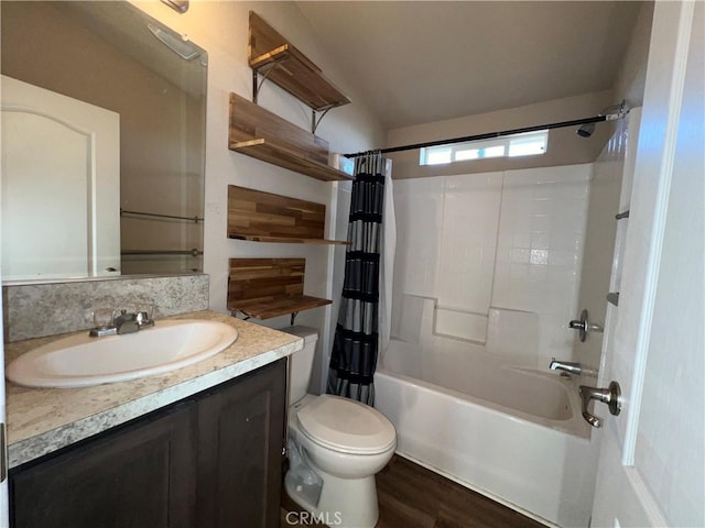 full bathroom with toilet, shower / bathtub combination with curtain, hardwood / wood-style flooring, and vanity