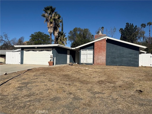 single story home featuring a garage