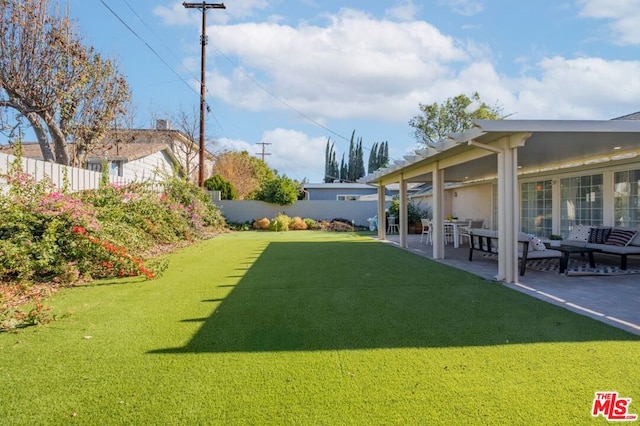 view of yard featuring a patio area