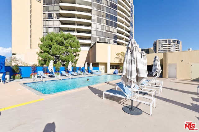 view of pool with a patio