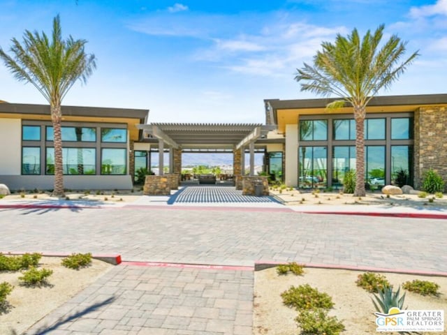 view of home's community with a pergola