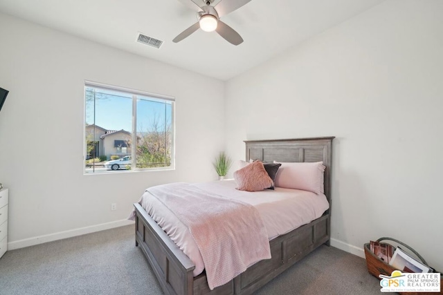 bedroom featuring ceiling fan and light carpet