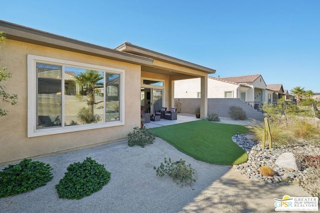 exterior space with a patio area