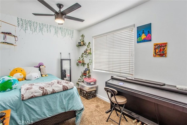 bedroom with ceiling fan and carpet