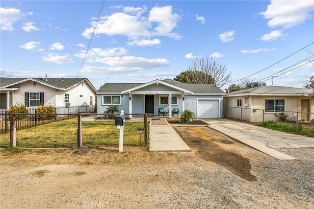 ranch-style home featuring a garage and a front lawn