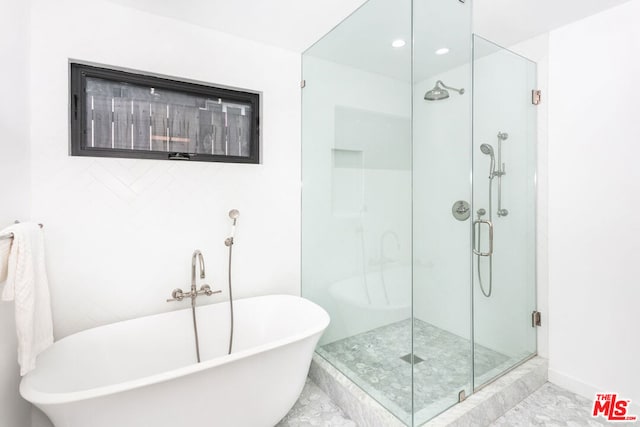 bathroom with independent shower and bath