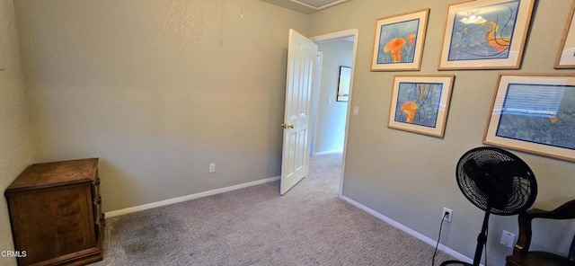 interior space featuring light colored carpet