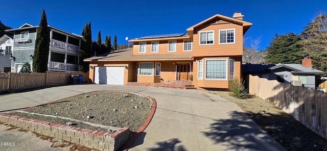 front of property with a garage