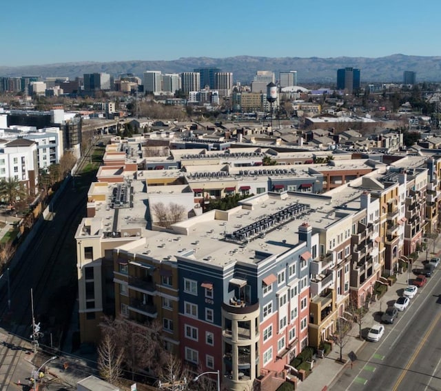 property's view of city with a mountain view