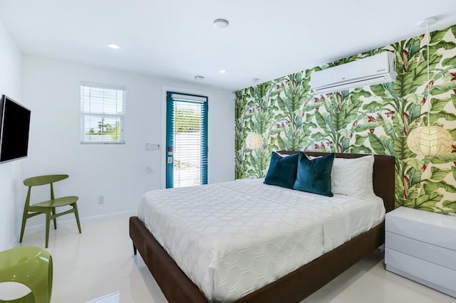 bedroom featuring an AC wall unit