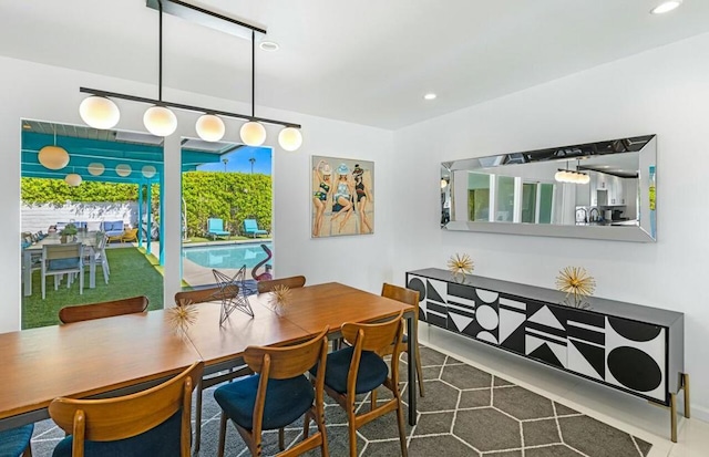 dining space featuring tile patterned floors