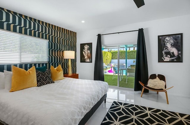 bedroom with access to outside and tile patterned floors