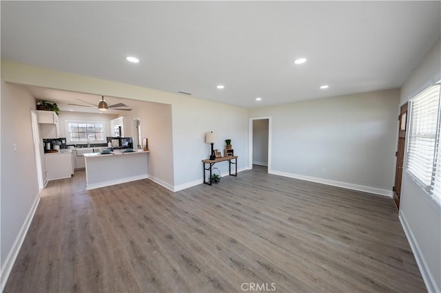 unfurnished living room featuring light hardwood / wood-style floors