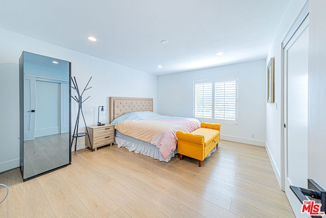 bedroom featuring light hardwood / wood-style floors