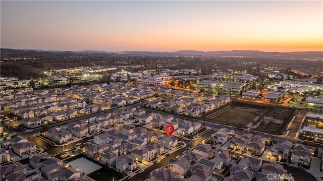 view of aerial view at dusk