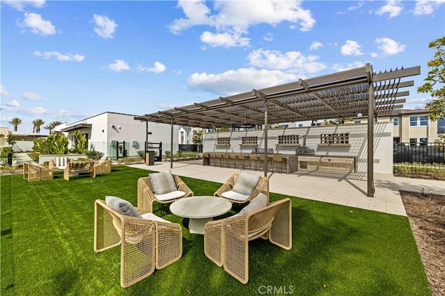 surrounding community featuring a pergola, a bar, a yard, and a patio