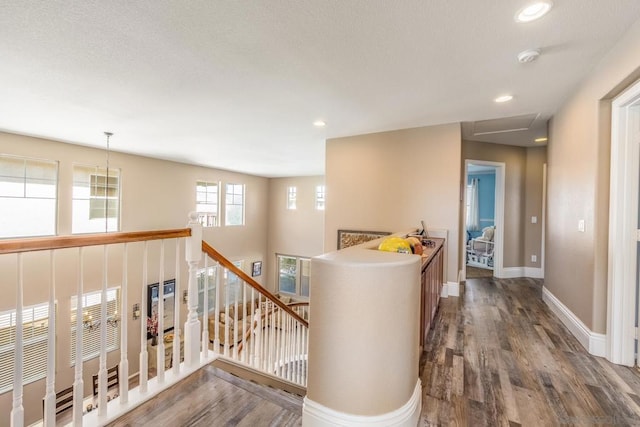 corridor featuring hardwood / wood-style flooring