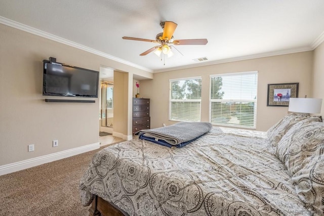 carpeted bedroom featuring ensuite bathroom, ceiling fan, and ornamental molding