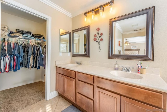 bathroom featuring ceiling fan, tile patterned floors, vanity, and crown molding