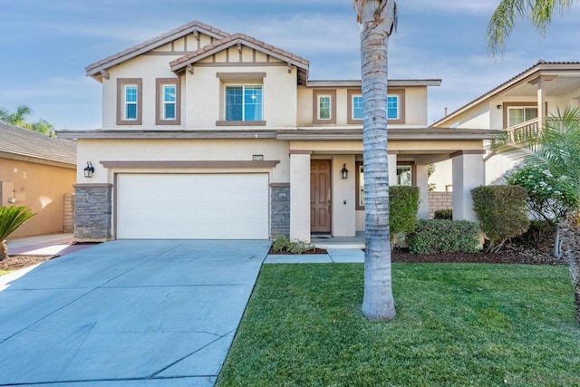 view of front of house with a front lawn and a garage